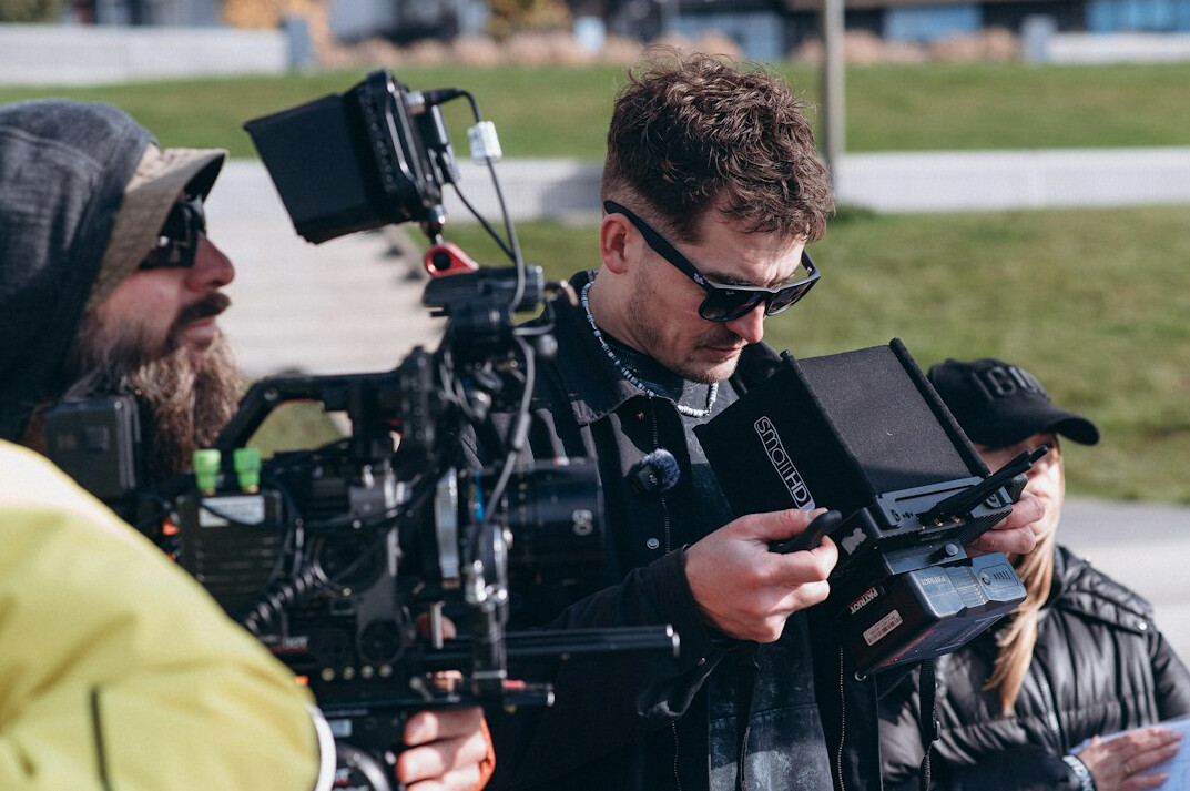 filmmaker directing movie set