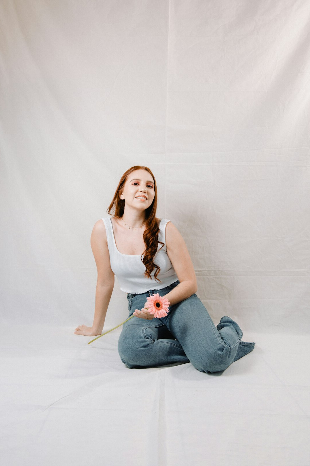 Portrait of a European woman video editor smiling in a studio