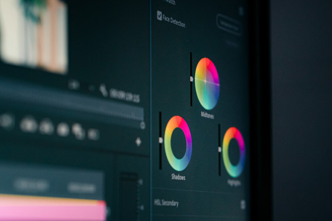 filmmaker adjusting audio levels