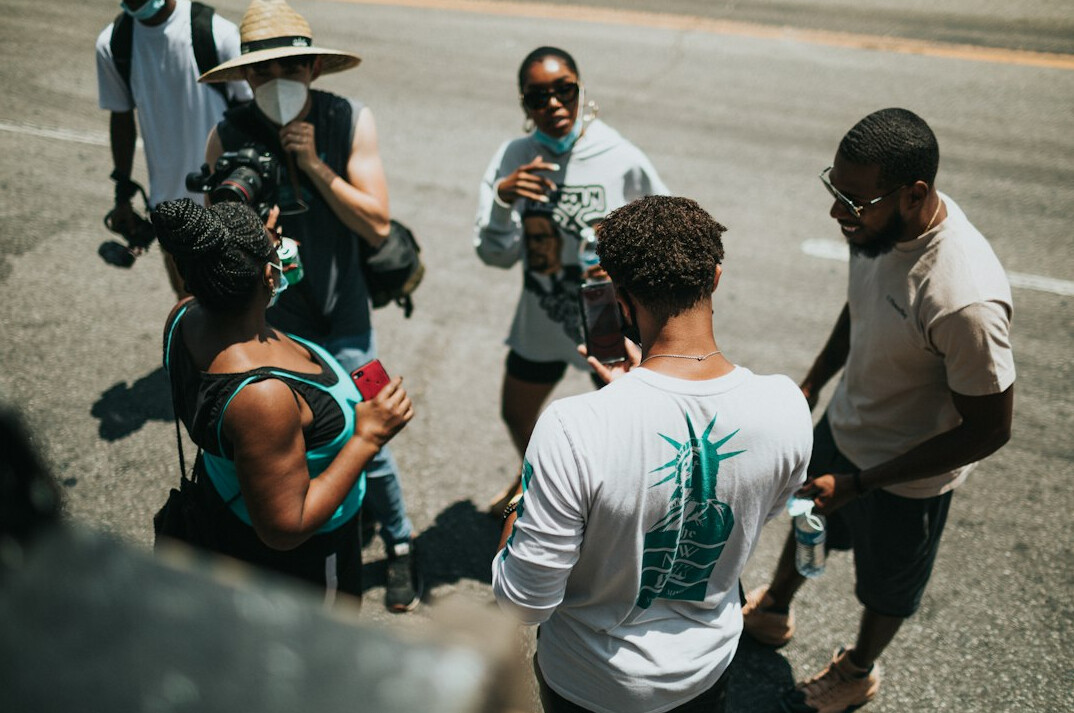diverse film crew celebrating